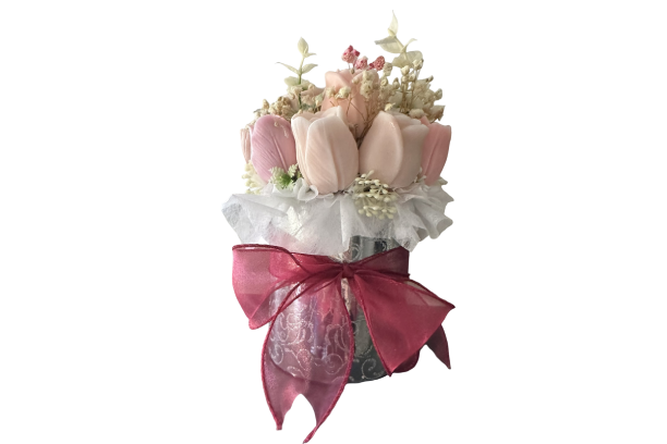 Pink tulip bouquet in vase with ribbon