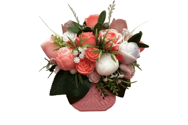 Pink and white floral arrangement in pink vase