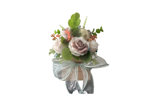 Small pink rose arrangement with ribbon bow