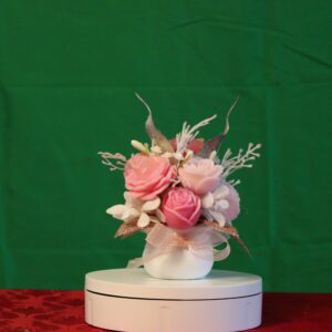 Pink rose bouquet in white vase