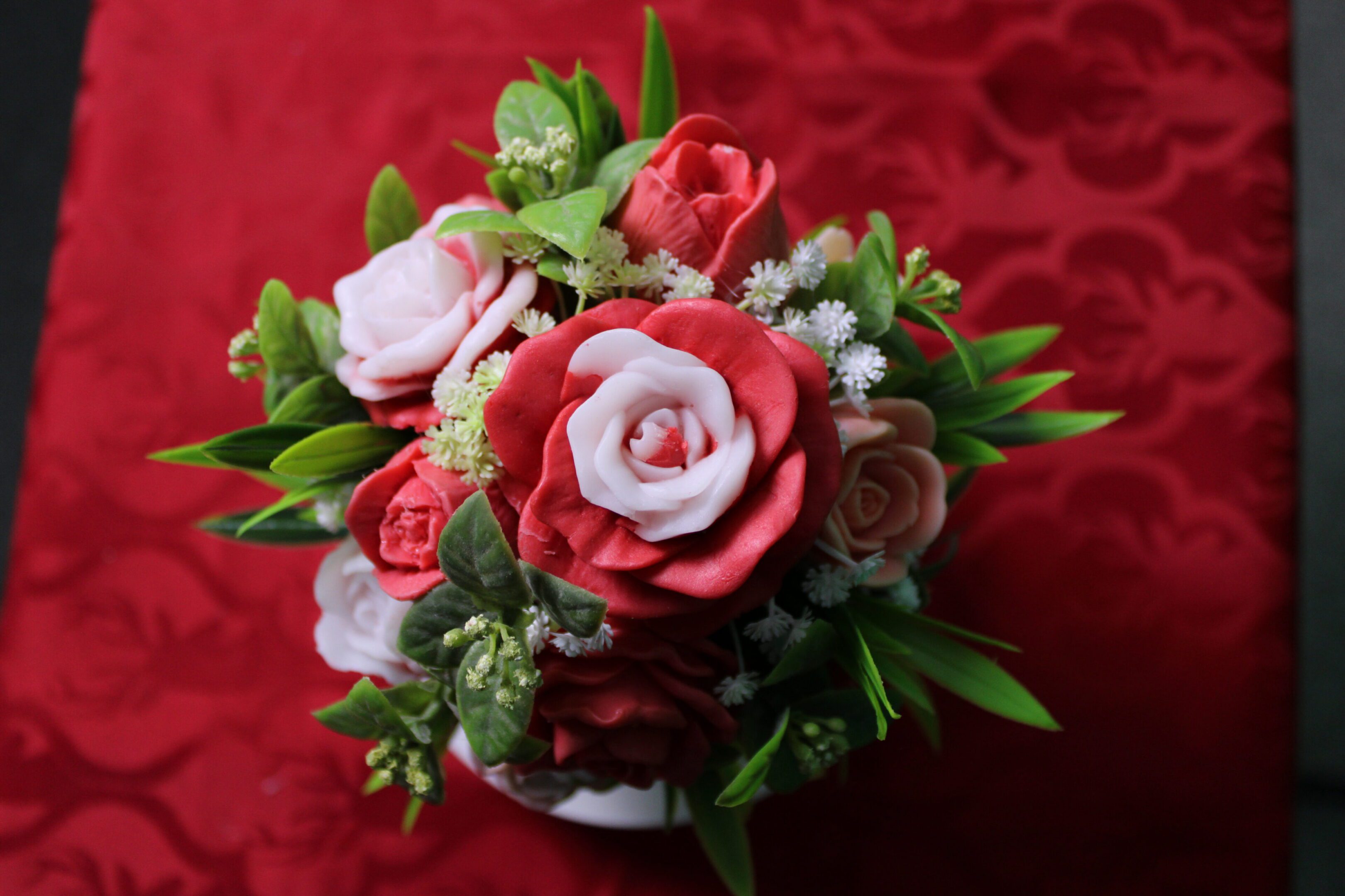 Pink and red rose bouquet with greenery