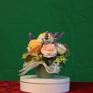 Roses and lavender bouquet in green pot